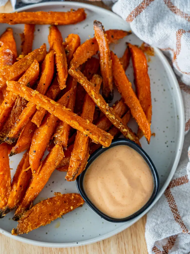 Crispy sweet potato fries served with a side of gochujang mayonnaise.