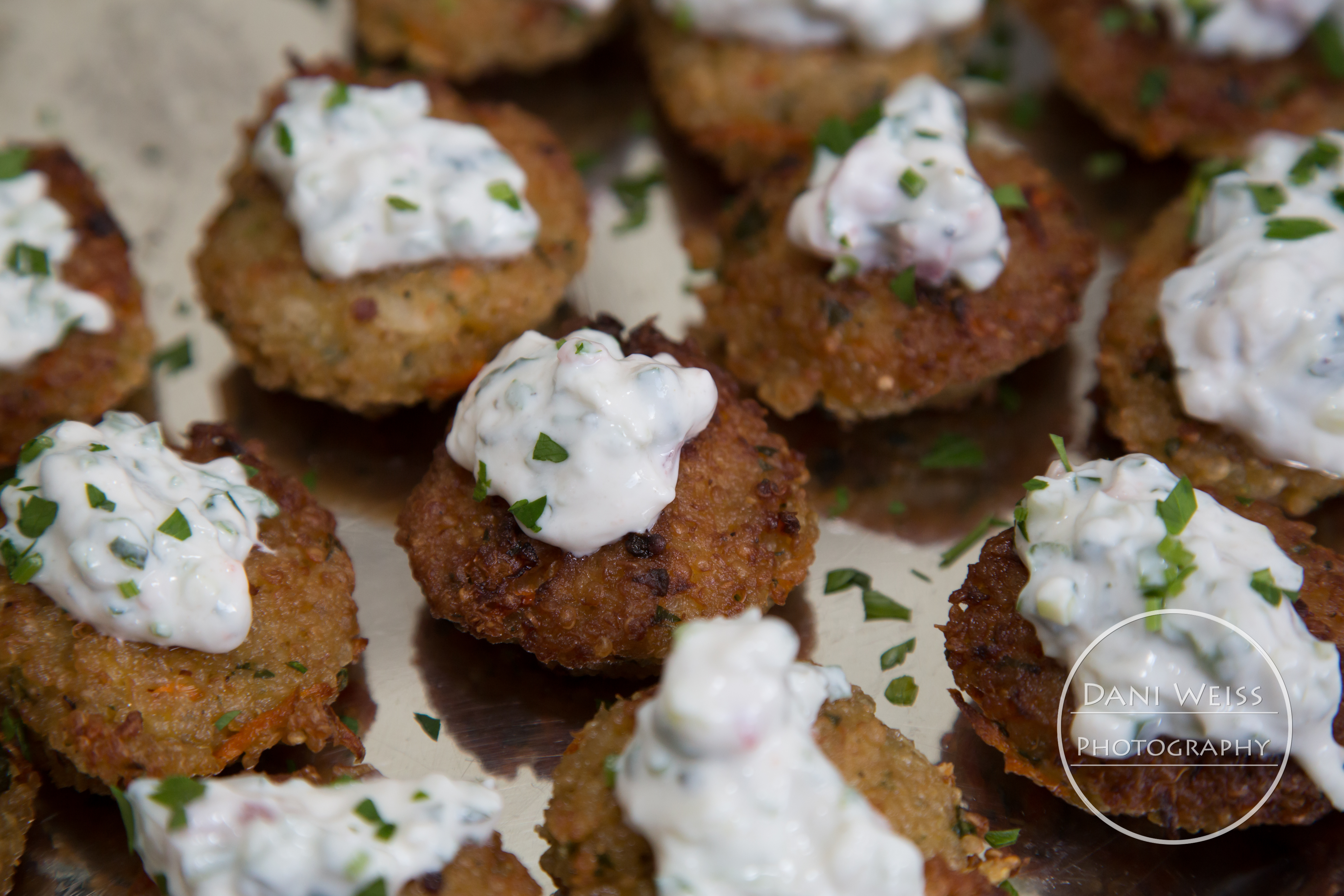 crispy quinoa cakes with a tart cucumber, mint yogurt sauce